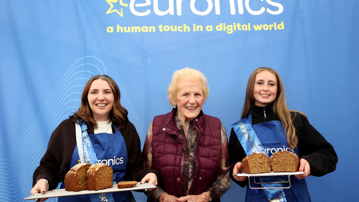 Olivia Nash and Cara Wall, winners of the 2026 Euronics National Brown Bread Baking Competitions, with Anna May McHugh - Euronics Ireland