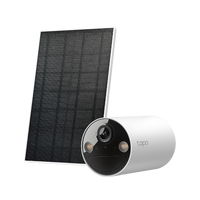 Tapo C410 KIT solar-powered security camera with solar panel, studio shot showing both kit components