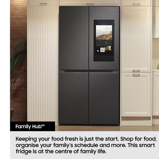 Samsung Family Hub RF65DG9H0EB1EU fridge freezer with Family Hub screen in a kitchen