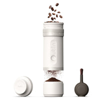 Outin Fino portable electric coffee grinder in Sandstone White