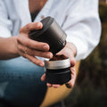 Outin Fino portable electric coffee grinder in Sandstone White