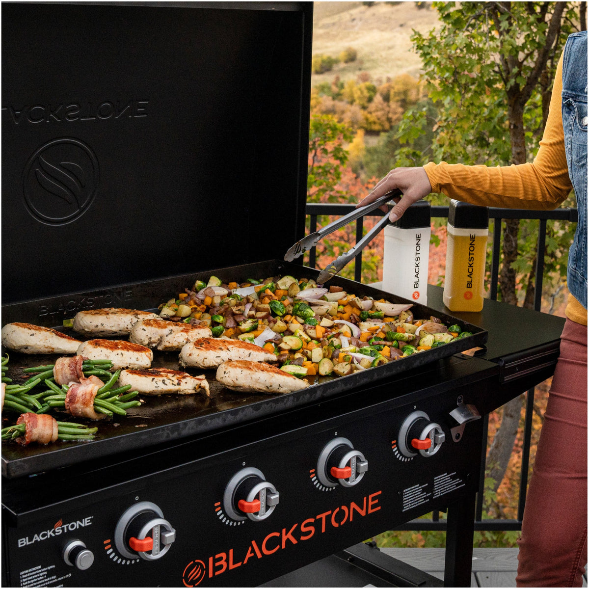 Blackstone Original 36" Griddle with Hood, 4 Burner Gas Griddle - Black - cooking chicken and vegetables