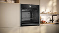 NEFF B64FS31G0B N90 Slide&Hide single oven with steam function in Graphite-Grey