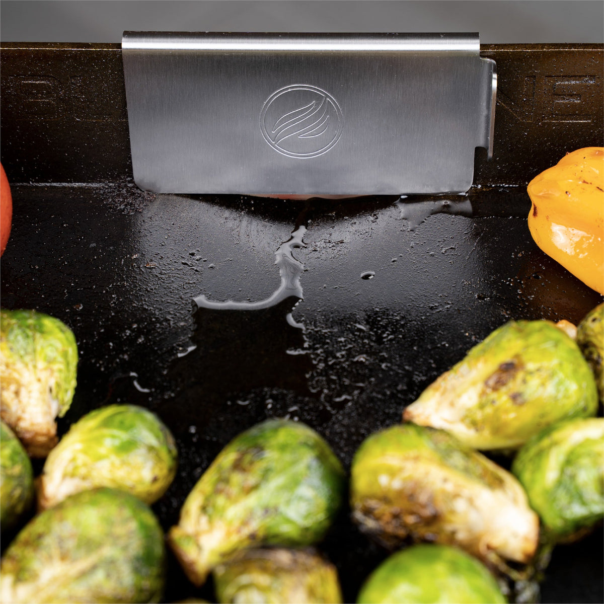 Blackstone Grease Gate and Tool Holder Combo - grease gate at the rear of the griddle
