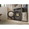 Haier X Series 5 10kg 1400 rpm Washing Machine - Graphite - in a utility room with door open