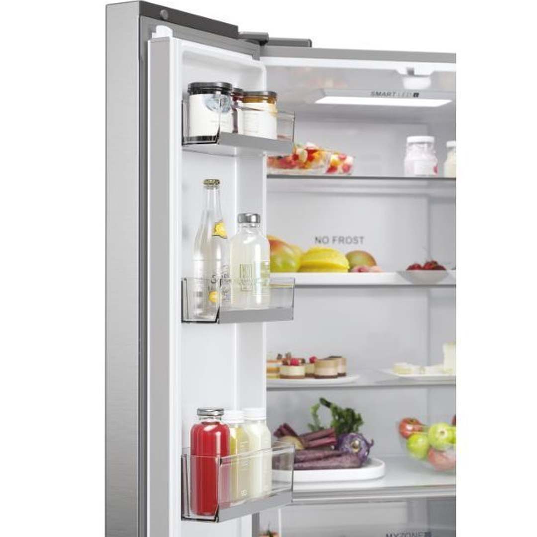 Haier HFR5719EWMP fridge door open, showing shelves with food