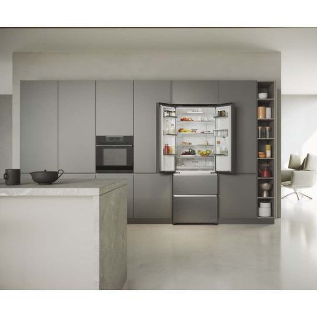 Haier HFR5719EWMP fridge freezer with doors open in a modern kitchen