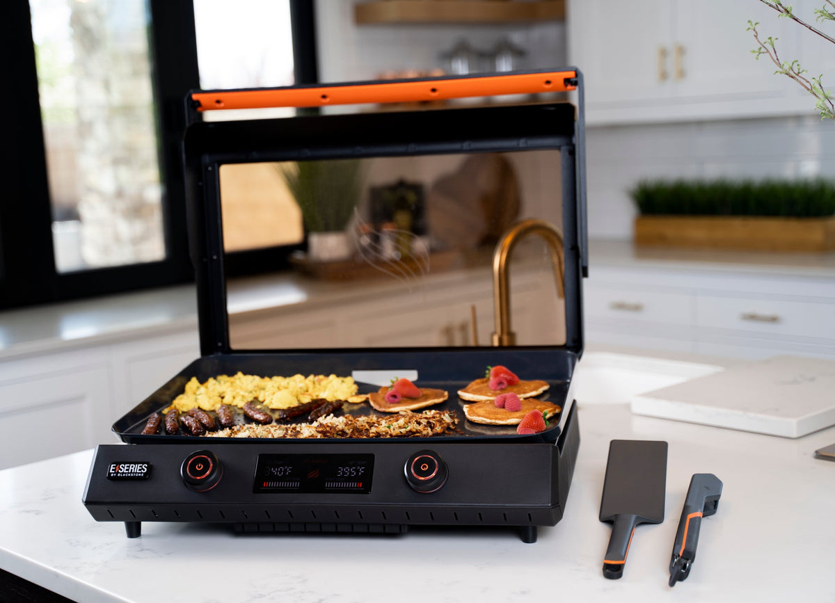 Blackstone E-Series 22" Electric Tabletop Griddle with Hood - Black - cooking in the kitchen