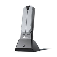TP-Link Archer TBE400UH BE6500 Wi-Fi 7 High Gain Wireless USB Adapter — product view on bundled desktop dock, antennas folded out
