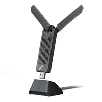 TP-Link Archer TBE400UH BE6500 Wi-Fi 7 High Gain Wireless USB Adapter — product view on dock, antennas spread
