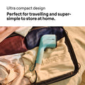 Braun QuickStyle 3 Garment Steamer - Green - packed in a suitcase for travel