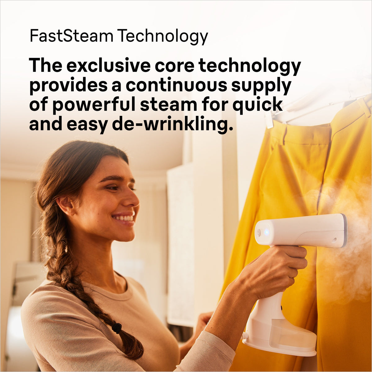 Braun QuickStyle 5 Garment Steamer - White/Purple - FastSteam de-wrinkling in use