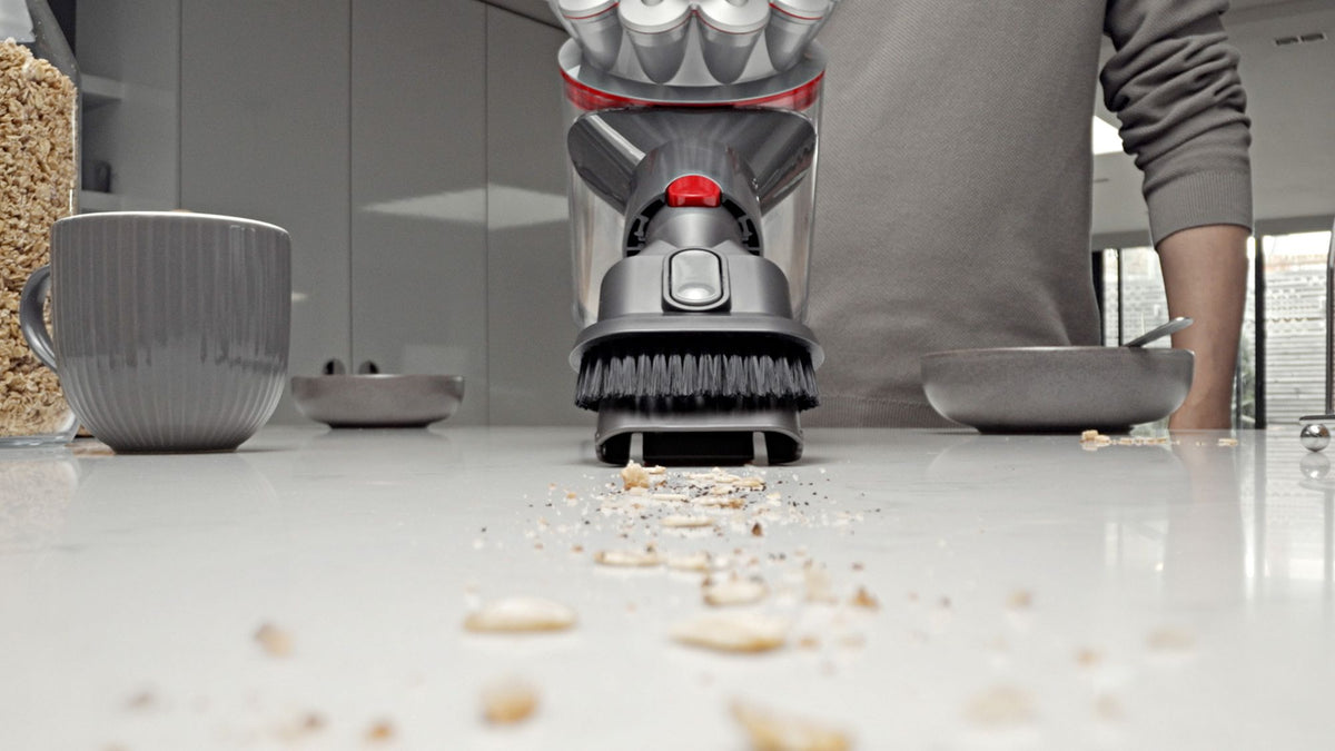 Dyson Car+Boat Handheld Vacuum Cleaner - Silver - crumbs on a worktop