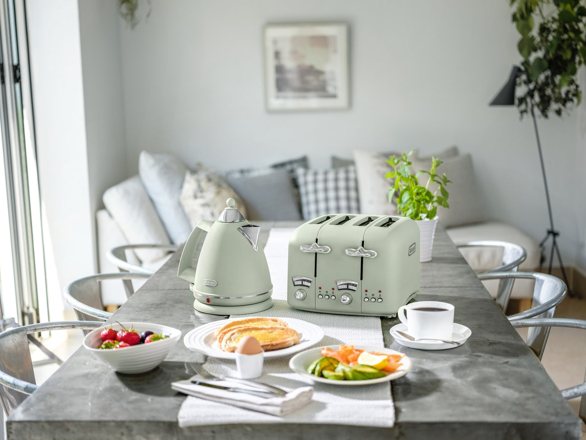 De'Longhi Argento Flora Kettle - Green - breakfast table scene with the matching toaster