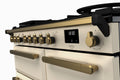 Rangemaster Estel Deluxe 100 Dual Fuel range cooker in Pale Cream with Antique Brass trim