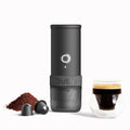 Outin Mino portable electric espresso machine in Space Grey with capsule adapter, filter basket and coffee cup