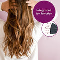 Beurer HC 25 Travel Hair Dryer, integrated ion function detail on woman's hair