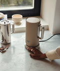 Aarke Temperature Control Kettle in Sand — lifestyle countertop shot