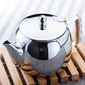 Stellar Traditional Teapot ST08 lifestyle shot on wooden slat mat