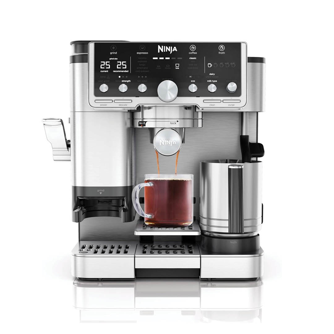 Ninja Luxe Cafe Pro ES701UK espresso machine, front view with a cup of coffee