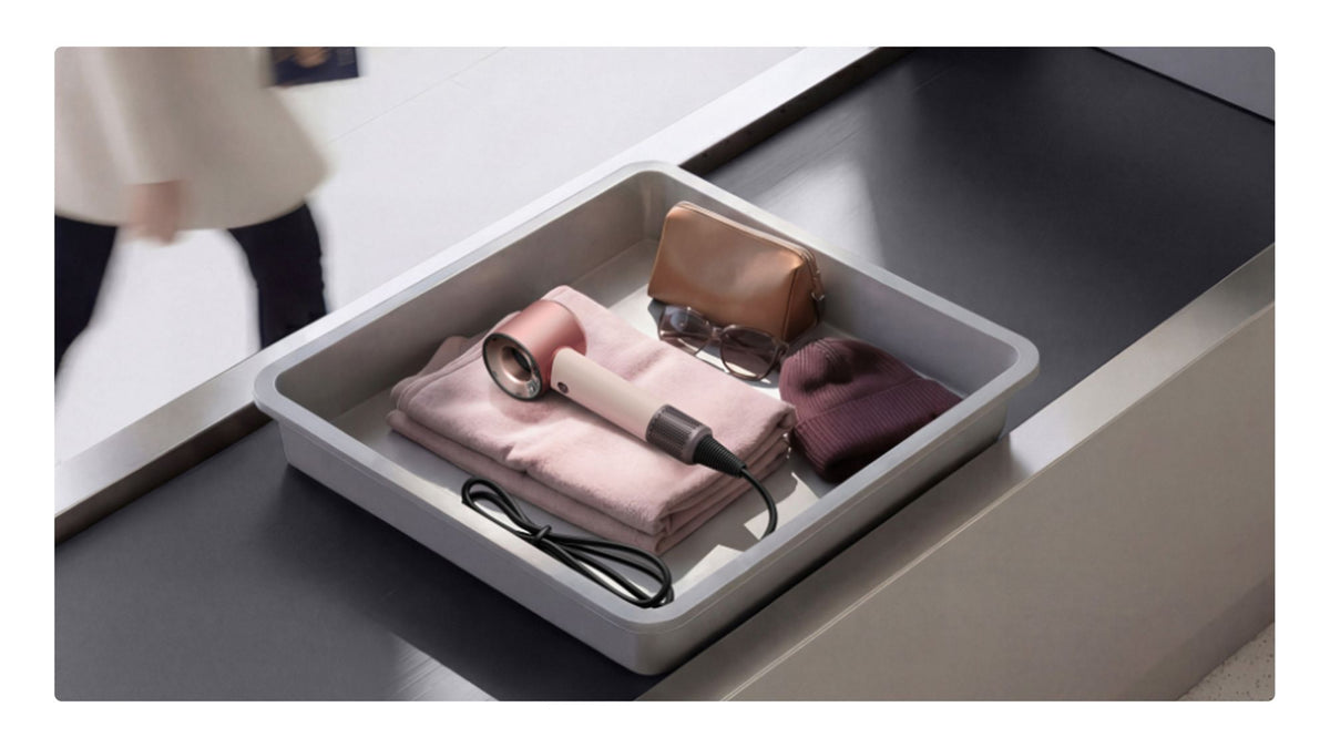 Dyson Supersonic Travel Hair Dryer - Ceramic Pink/Rose Gold - in an airport tray