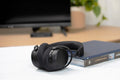 Sennheiser RS 275 TV Headphones — lifestyle shot in front of TV