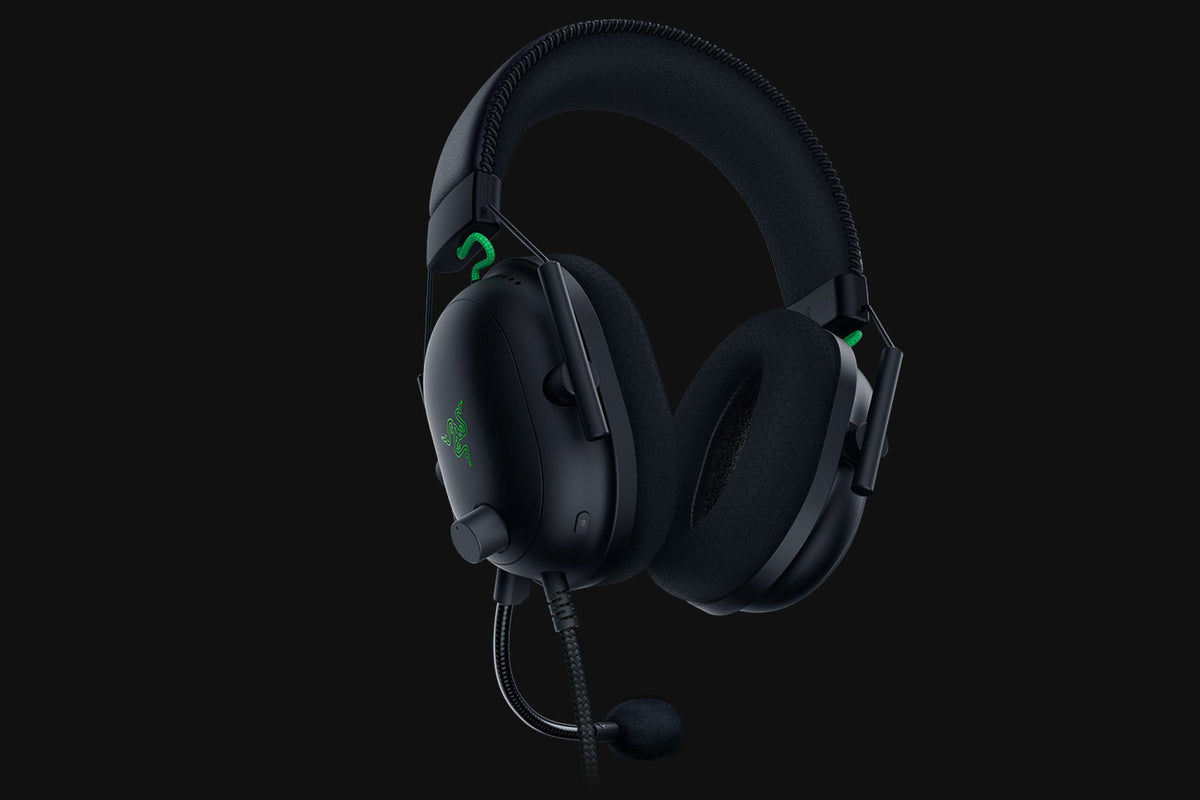 Razer BlackShark V2 Wired Esports Headset with USB Sound Card - Black - angled view, studio