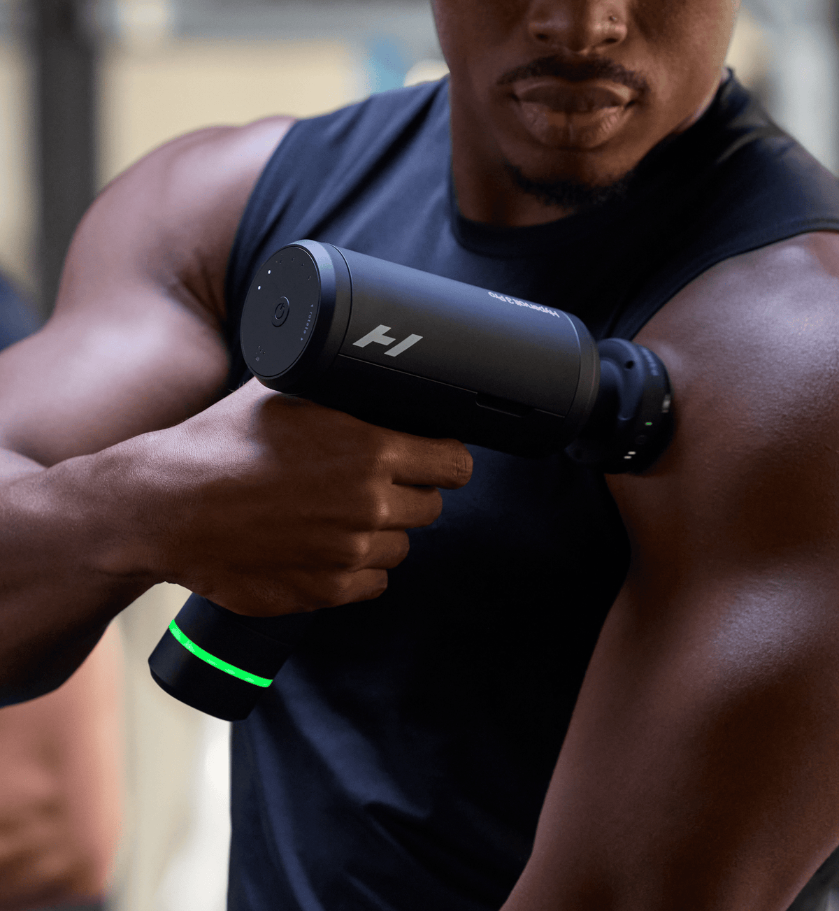 Hyperice Hypervolt 3 Pro Percussion Massage Gun - Black - arm treatment close-up