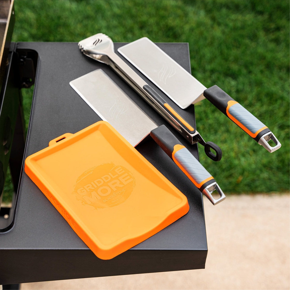 Blackstone Silicone Spatula Mat - Orange - tools resting on the mat