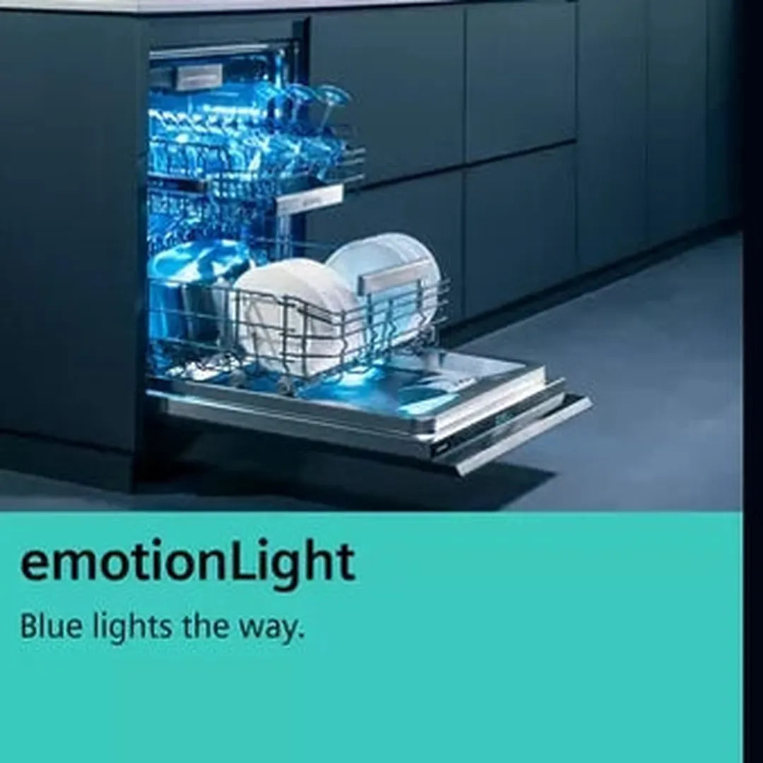 Siemens iQ500 SN85EX69CG dishwasher with emotionLight, shown in a kitchen with the racks pulled out