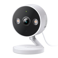 Tapo C120 indoor/outdoor Wi-Fi security camera, front three-quarter view with integrated spotlights
