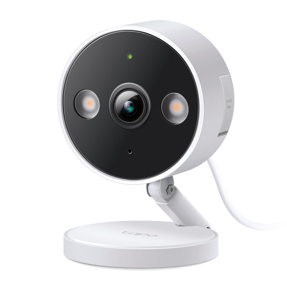 Tapo C120 indoor/outdoor Wi-Fi security camera, front three-quarter view with integrated spotlights