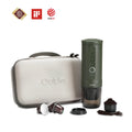 Outin Nano Forest Green portable espresso machine beside its Nano Protective Case with capsule storage