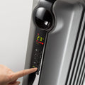 De'Longhi Radia S 1.5kW Oil-Filled Radiator - Grey - setting the temperature