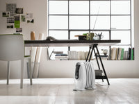 De'Longhi Nano 500W Oil-Filled Radiator - White - next to a desk in a home office