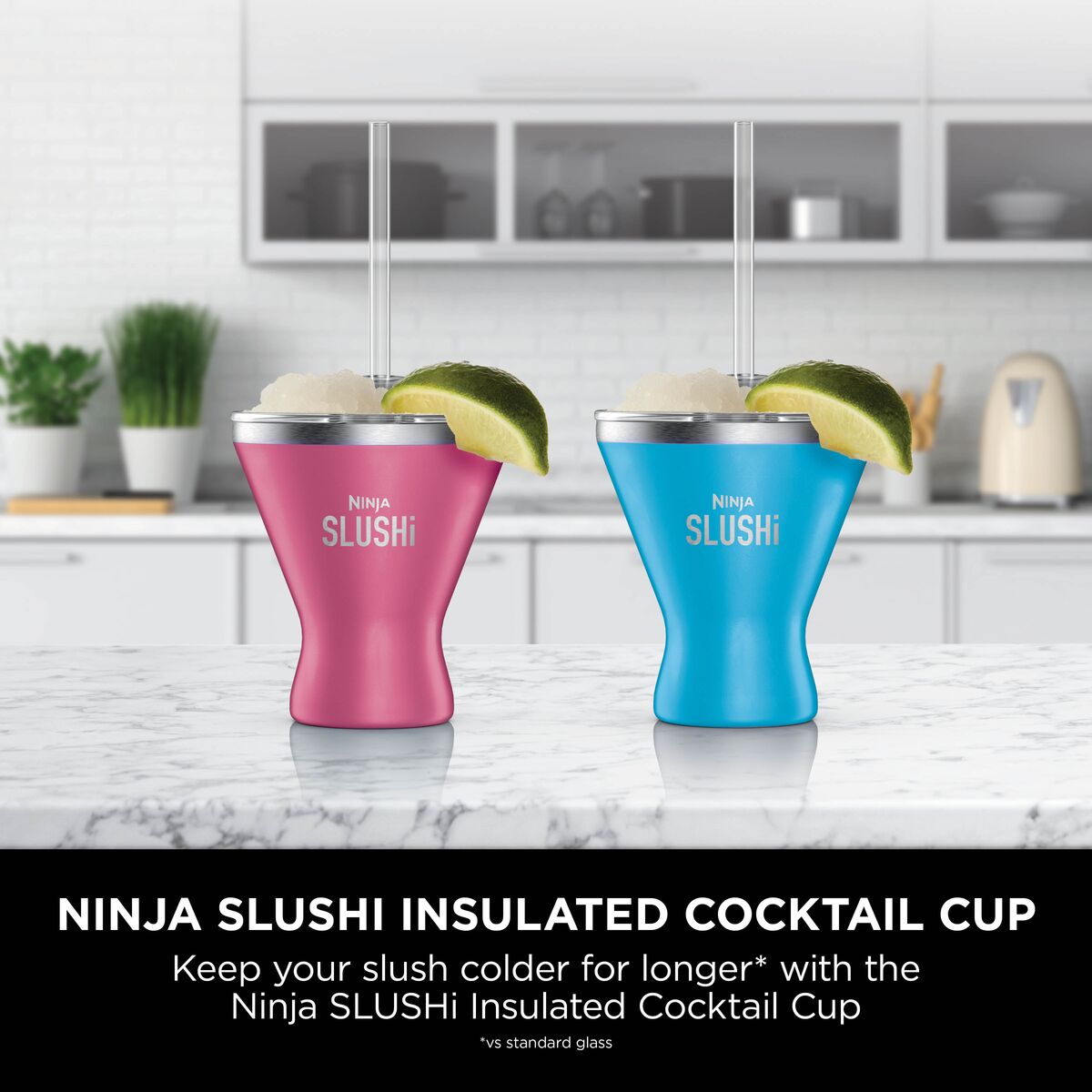 Two Ninja SLUSHi Pink and Bright Blue insulated cocktail cups on a kitchen counter, lifestyle shot