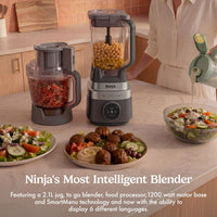 Ninja CrushBOSS 3-in-1 Kitchen System in Onyx, white background, all three vessels filled with food