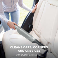 Shark WandVac Deluxe Pet Pro with Duster Crevice Tool cleaning a car back seat, captioned 'Cleans cars, corners and crevices'
