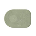 Outin Silicone Coffee Mat in green with geometric ridged surface