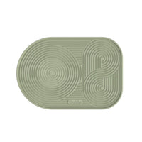 Outin Silicone Coffee Mat in green with geometric ridged surface