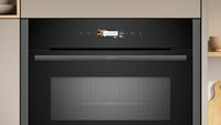 NEFF N70 C24MR21G0B built-in compact oven with microwave in Graphite-Grey