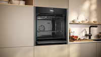 NEFF N70 Slide&Hide smart built-in single oven B54CR31G0B in Graphite-Grey