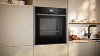NEFF B64FS31G0B N90 Slide&Hide single oven with steam function in Graphite-Grey