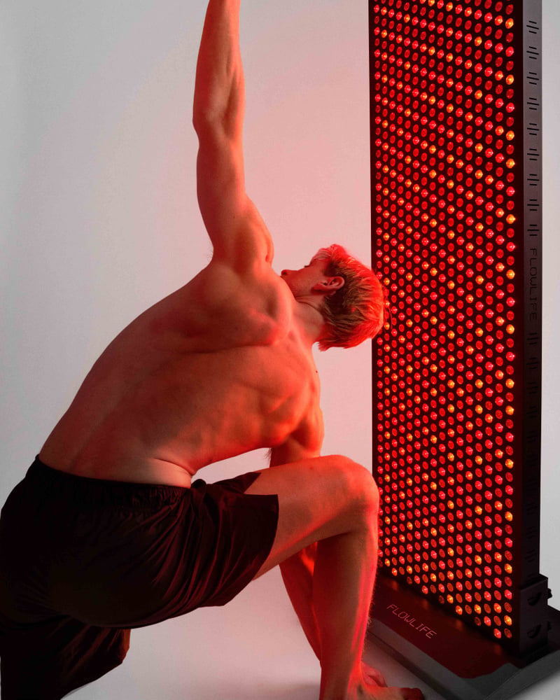 Flowlife Flowlight Panel 4300 Eight Waves Full-Body Red Light Panel - Black - stretching in front of the panel