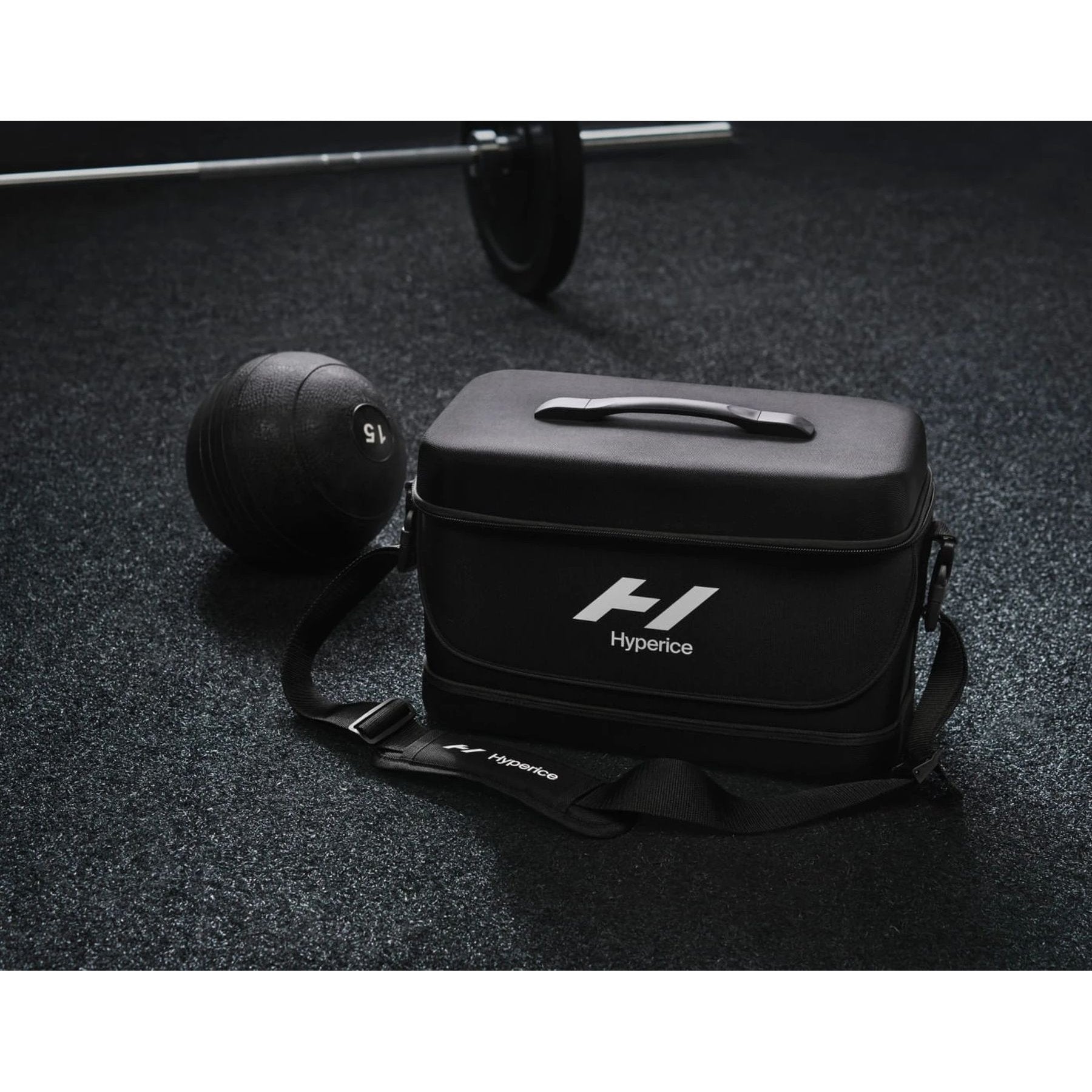 Hyperice Normatec Carry Case, black, lifestyle view in gym setting