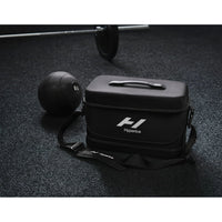 Hyperice Normatec Carry Case, black, lifestyle view in gym setting