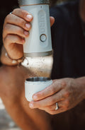 Outin Fino portable electric coffee grinder in Sandstone White