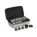 Outin Nano Forest Green portable espresso machine beside its Nano Protective Case with capsule storage