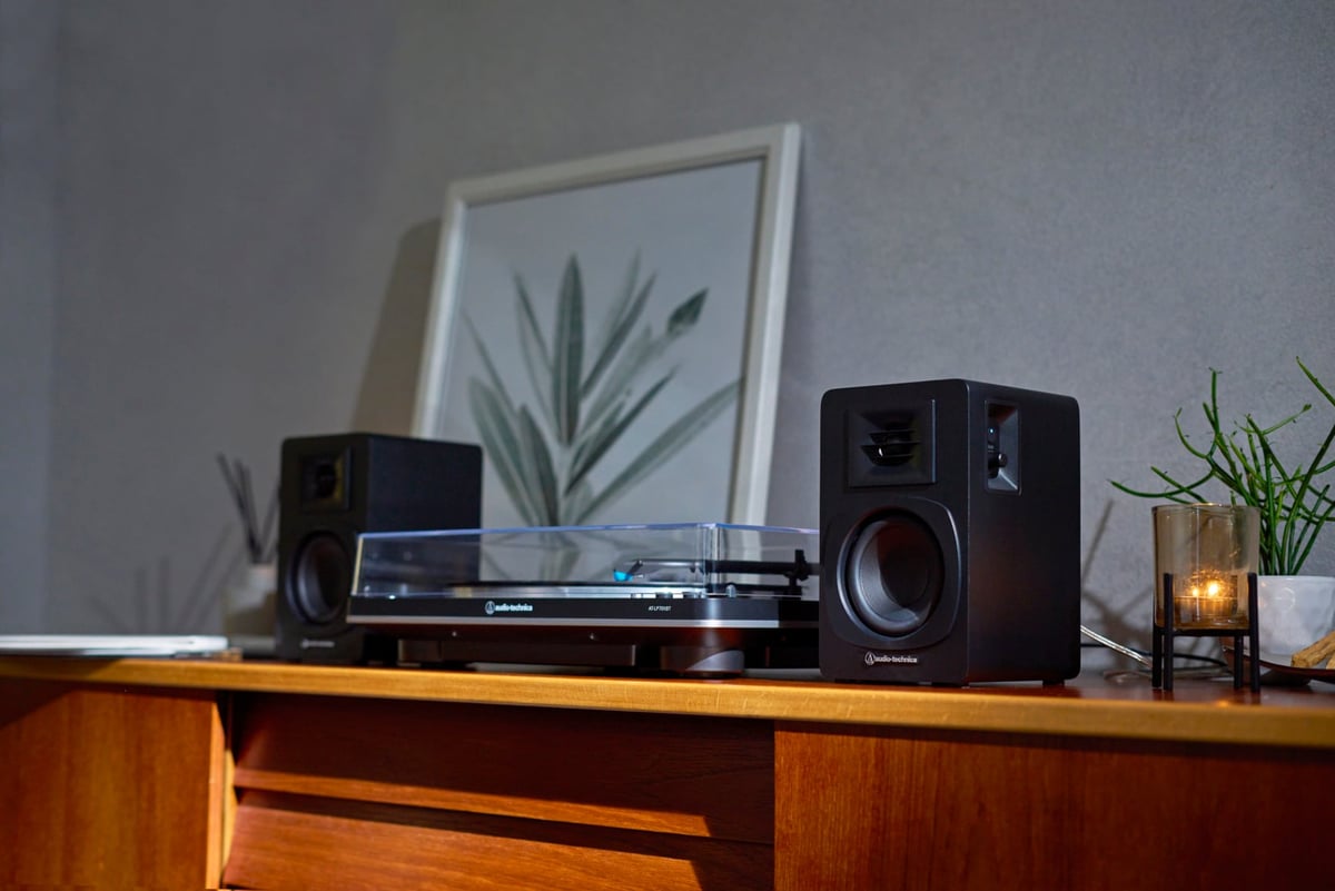 Audio-Technica AT-SP3X black powered speakers lifestyle view