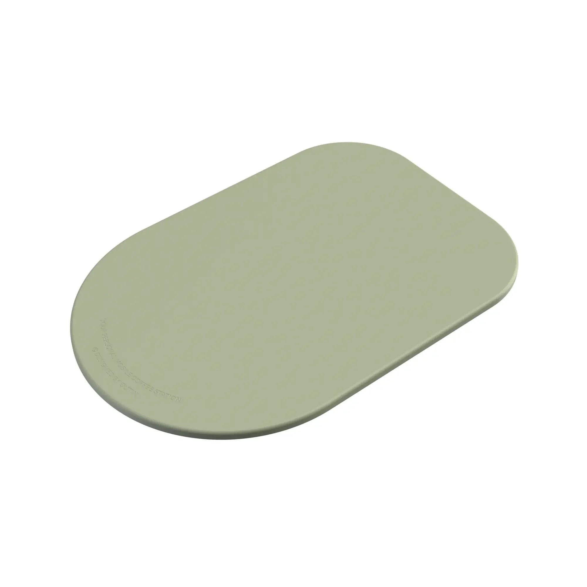 Outin Silicone Coffee Mat in green with geometric ridged surface